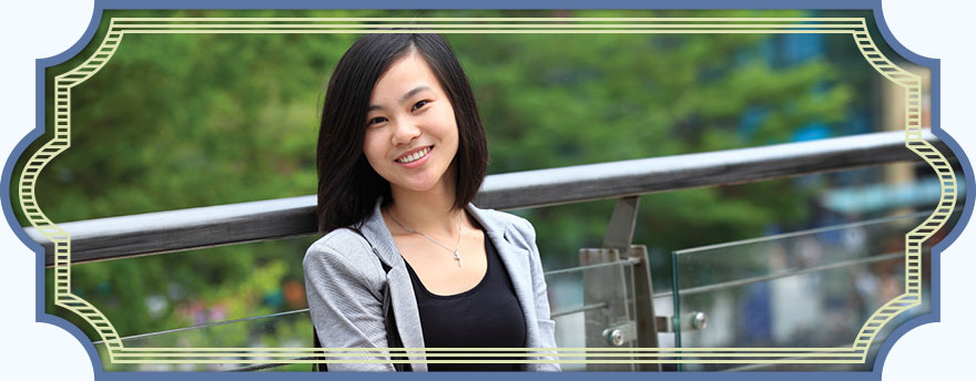 Asian women smiling on a bridge